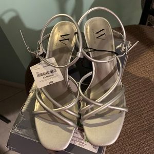 Silver size 7.5 Medium sandals, new with tags in original box.Worthington.